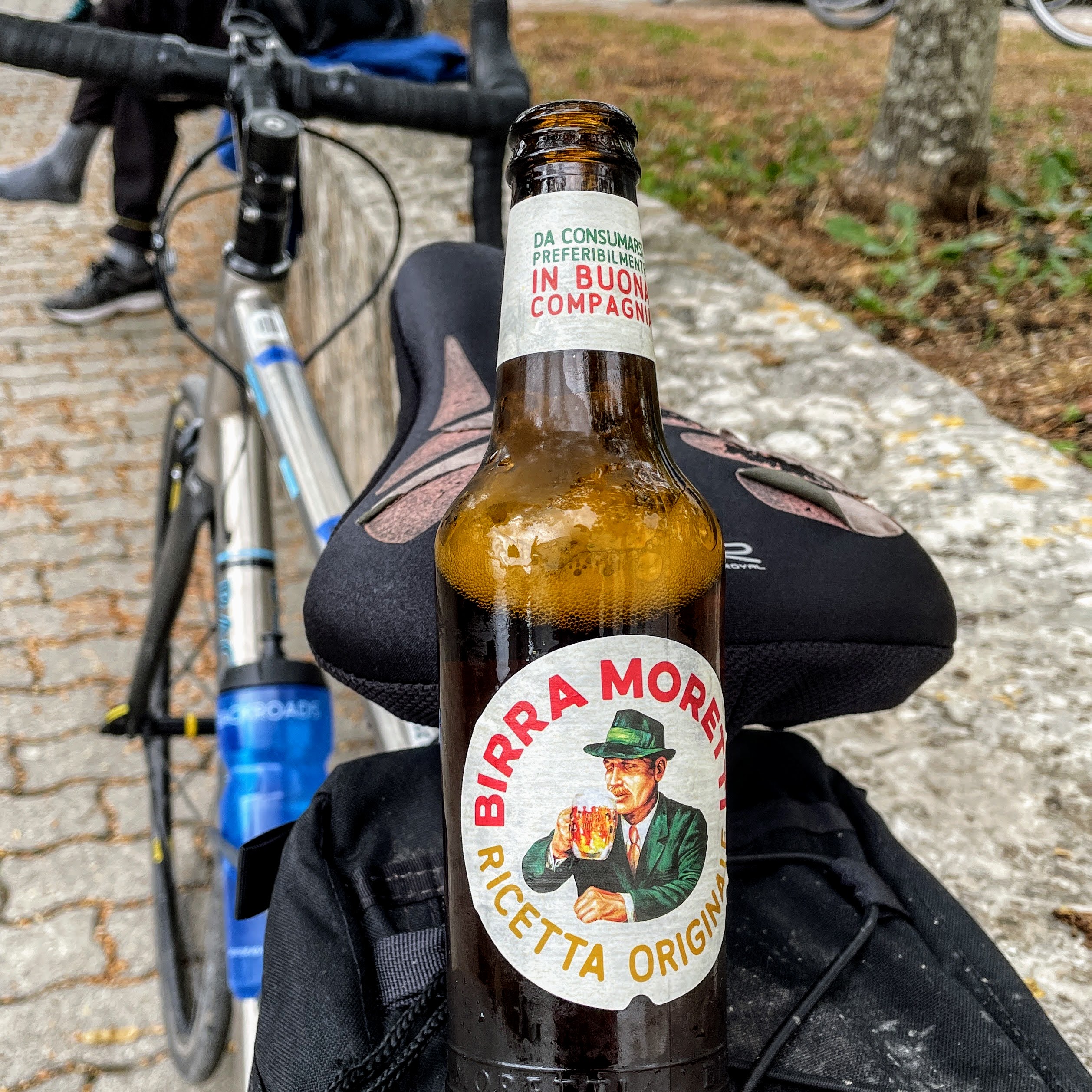 Beer Bottle On Back of a Bike Luggage Rack